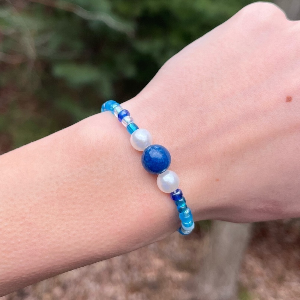 Handmade beaded bracelet wax string blue glass beads
